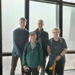 Swiss family takes commemorative photo with guide on Tokyo Tower Main Deck