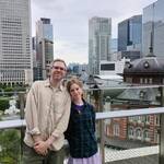 American friendly family explored Tokyo street.