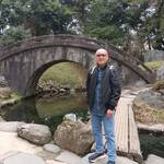 Active Malaysian senior enjoyed Tokyo shopping streets.